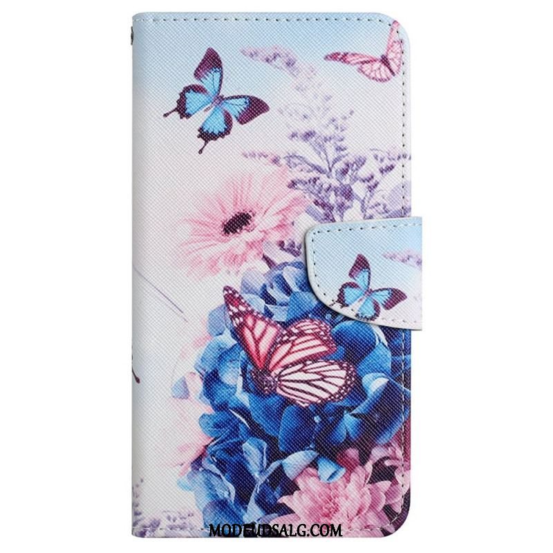 Flip Cover iPhone 15 Med Snor Sommerfugle Og Blomster Med Rem