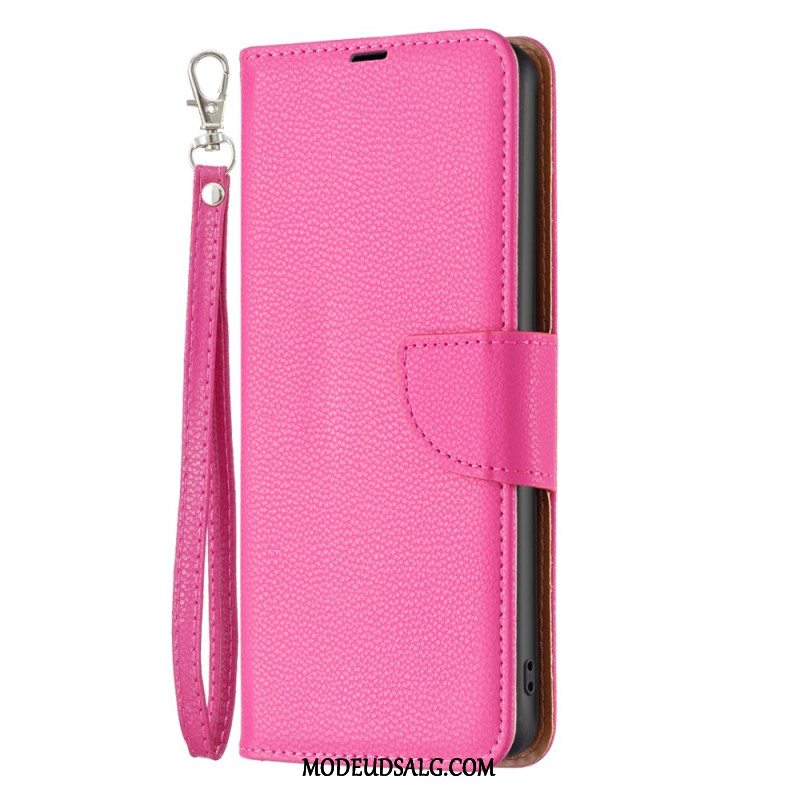 Flip Cover iPhone 16 Strappy Litchi Tekstur