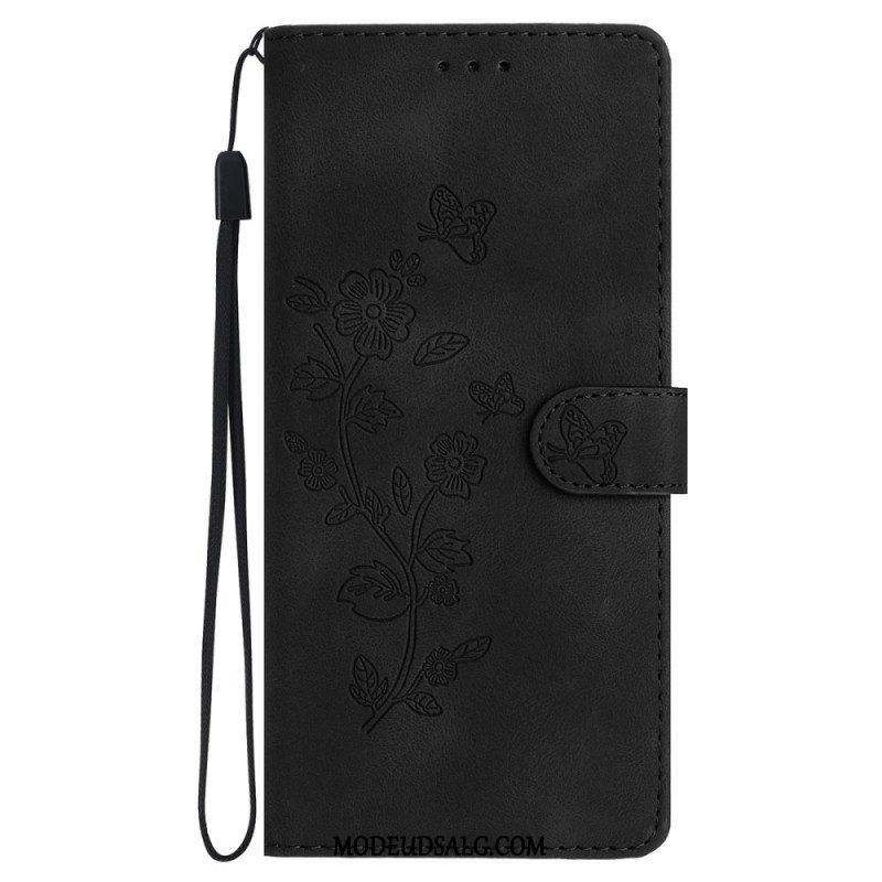 Flip Cover iPhone 16 Trykte Blomster Med Rem