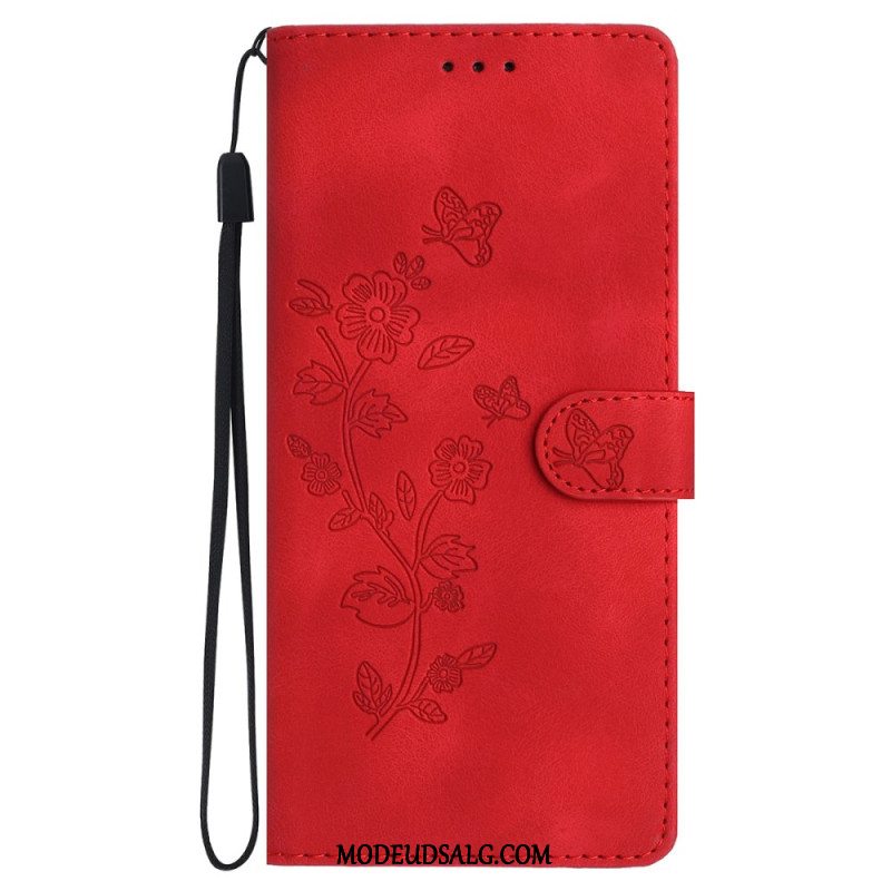 Flip Cover iPhone 16 Trykte Blomster Med Rem