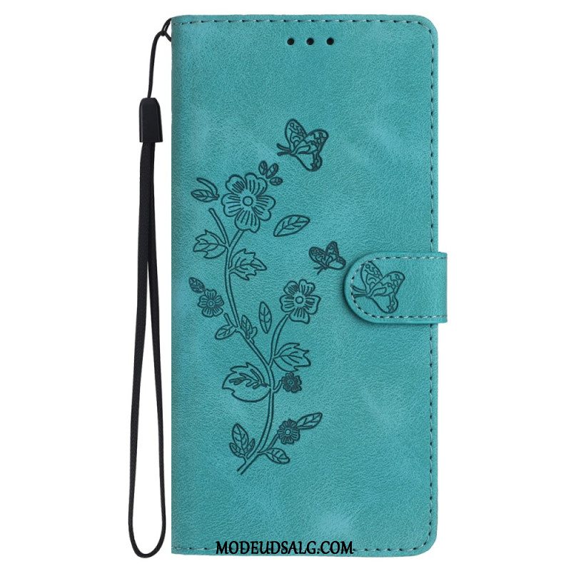 Flip Cover iPhone 16 Trykte Blomster Med Rem