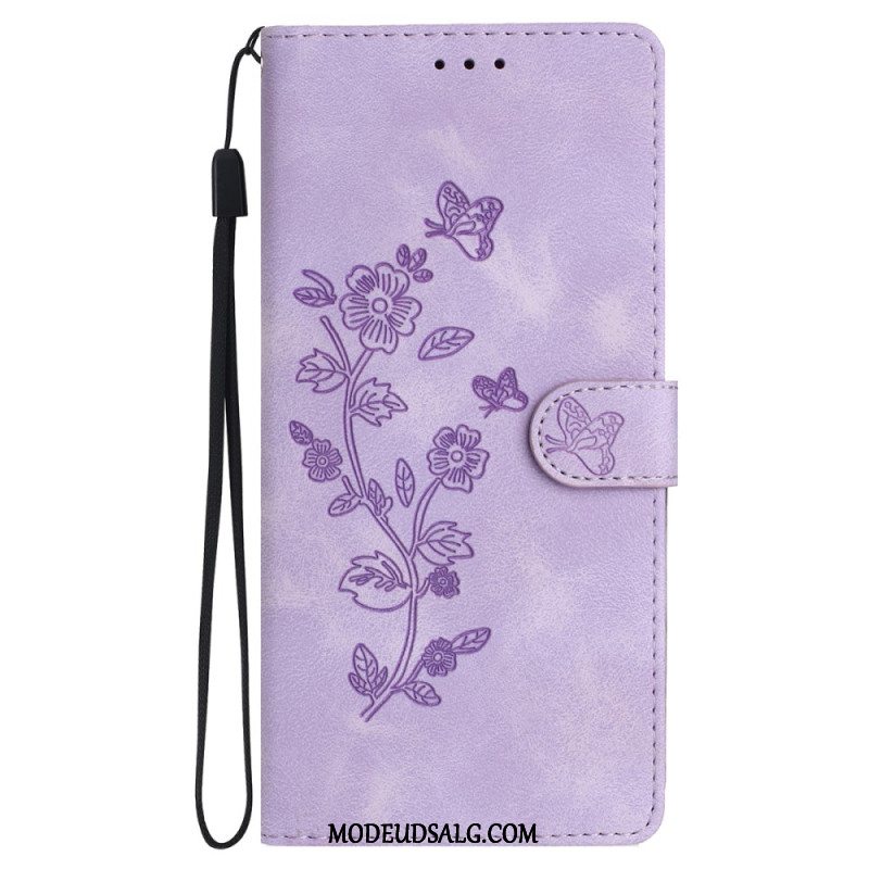 Flip Cover iPhone 16 Trykte Blomster Med Rem