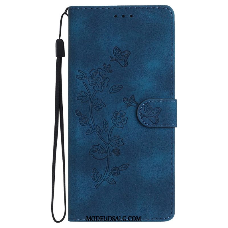 Flip Cover iPhone 16 Trykte Blomster Med Rem