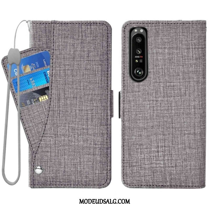 Læder Cover Sony Xperia 1 IV Jeans Med Roterende Kortholder